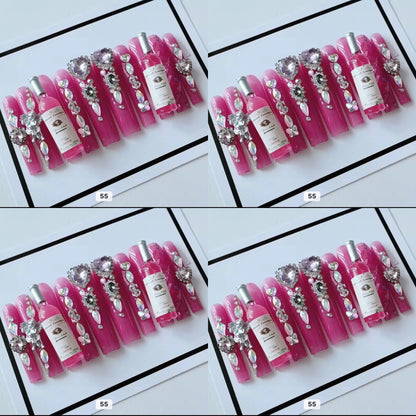 Pink acrylic press on nails with champagne