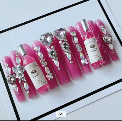 Pink acrylic press on nails with champagne